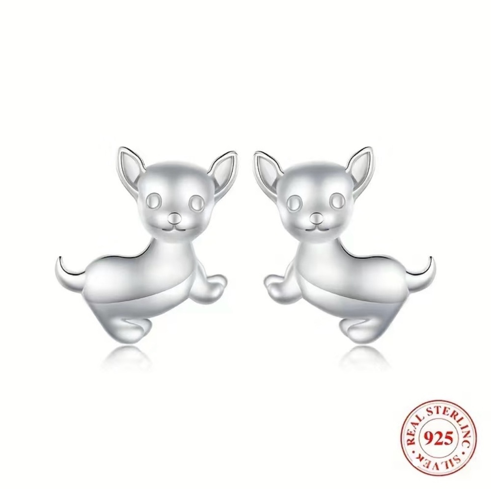 Sterling Silver Dog Earrings. Sells For $12